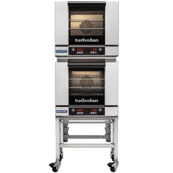 A Moffat Turbofan double deck electric convection oven with one oven open.