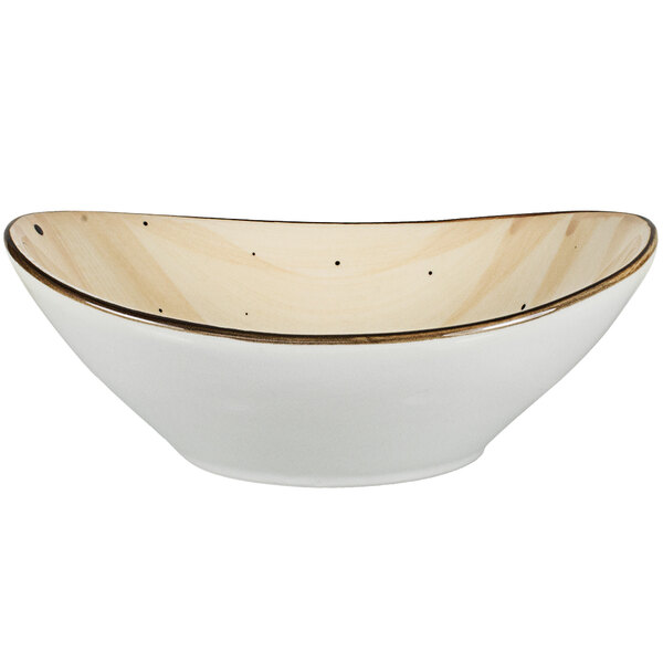 An International Tableware Rotana white porcelain bowl with a brown rim.