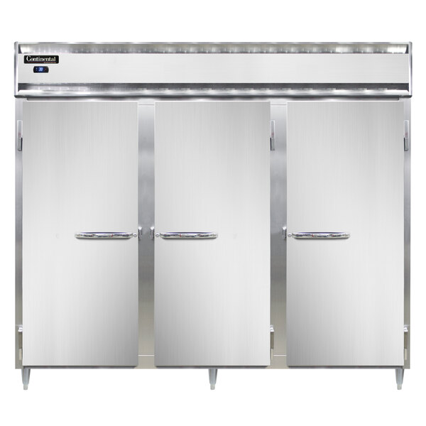 A Continental Refrigerator reach-in refrigerator with three white doors open.