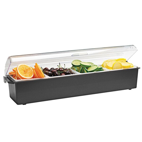 A Vollrath black plastic condiment bar tray with 4 quart inserts holding fruit and vegetables.