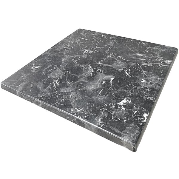 A black and white marbled American Tables & Seating Isotop table top.