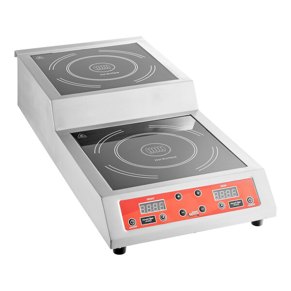 A stainless steel double countertop step-up induction range with digital controls and two cooking surfaces.