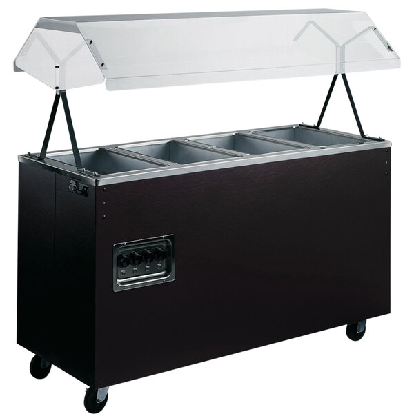 A black Vollrath portable hot food station with a clear cover.