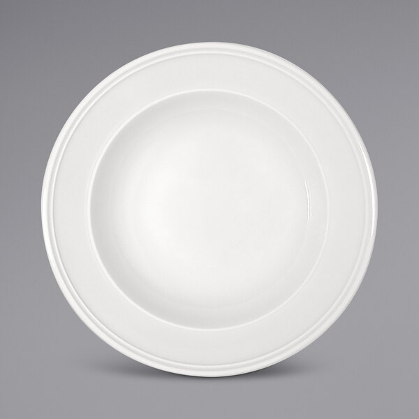 A Bauscher bright white porcelain plate with a wide circular edge.