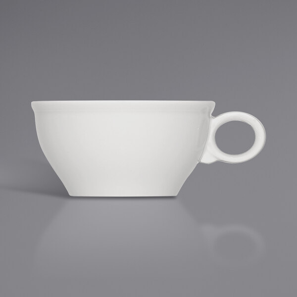 A Bauscher bright white porcelain cup with a handle.