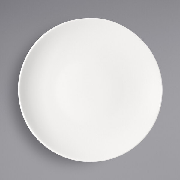 A Bauscher bright white porcelain half-deep coupe plate on a white background.