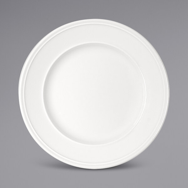 A Bauscher bright white porcelain plate with a wide rim.