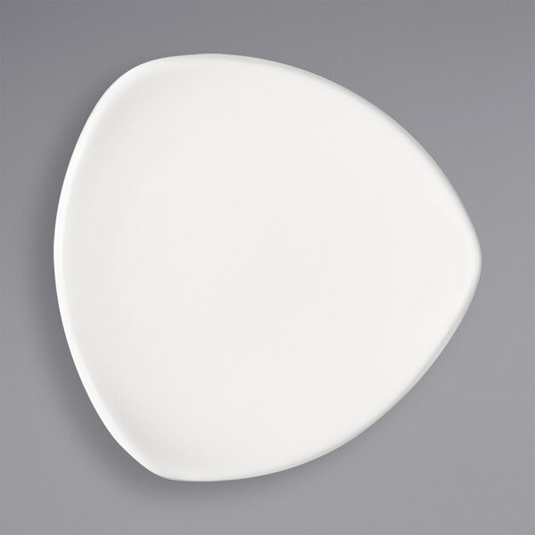 A Bauscher bright white porcelain plate with a circular design on it.