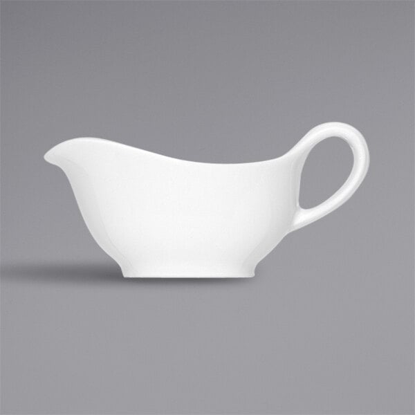 A white Bauscher gravy boat with a white background.