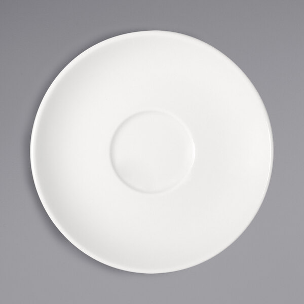 A Bauscher bright white porcelain saucer with a white circle on it.