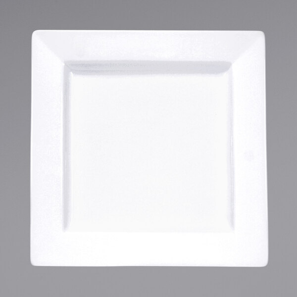 A white square porcelain plate with a white rim.