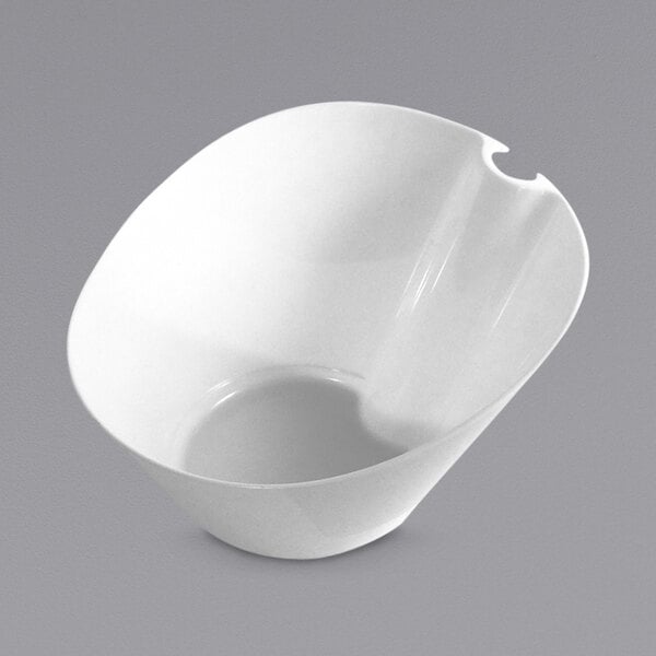 A white Fineline compostable bowl with a hole in the middle for utensils.