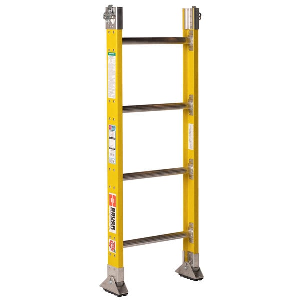 A yellow Bauer Corporation base section for a sectional ladder with metal bars.