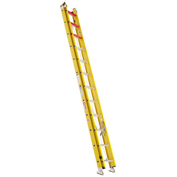 A yellow Bauer Corporation 310 Series fiberglass extension ladder.