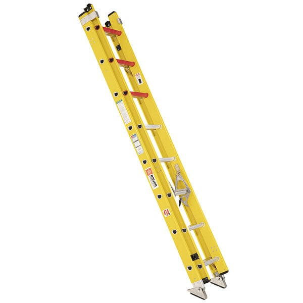 A yellow ladder with red ladders on the side and two orange handles.