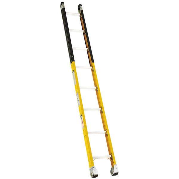 A yellow ladder with black handles.