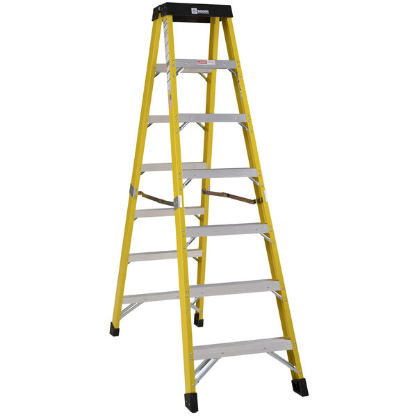 A yellow ladder with a black top.