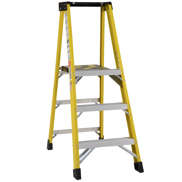 A yellow Bauer Corporation fiberglass platform ladder with black legs and a steel platform.