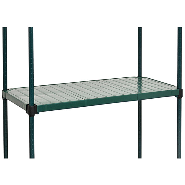 A green Eagle Group metal shelf with black truss rods and solid polymer mats.