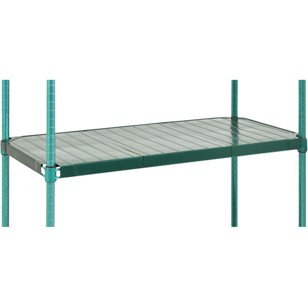 A green metal Eagle Group shelving unit with zinc shelves and metal poles.