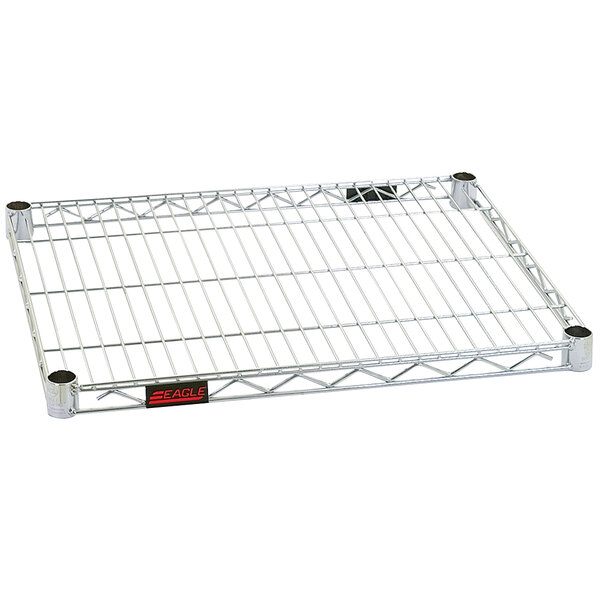 A stainless steel Eagle Group wire shelf with a metal rack on top.