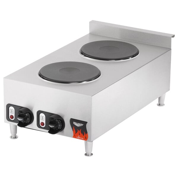 A silver Vollrath countertop electric hot plate with two black burners.