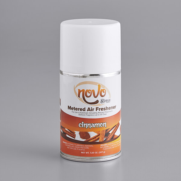 A white and red can of Noble Chemical Novo cinnamon air freshener refill.