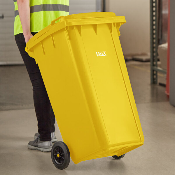 Lavex 50 Gallon Yellow Wheeled Rectangular Trash Can with Lid