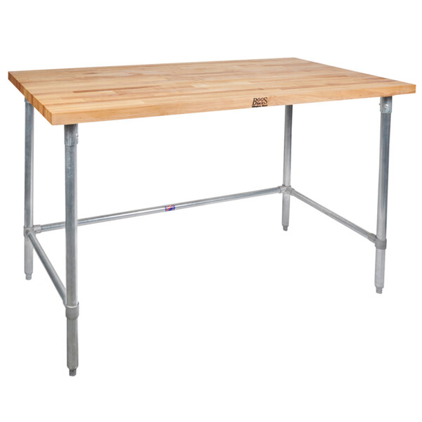 A John Boos wood top work table with a galvanized metal base.