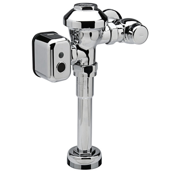 A close-up of a chrome Zurn urinal flush valve with silver and black accents.