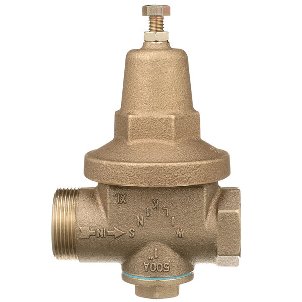 A close-up of a Zurn brass water pressure reducing valve.