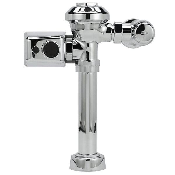 A chrome Zurn AquaSense toilet flush valve with a metal sensor.