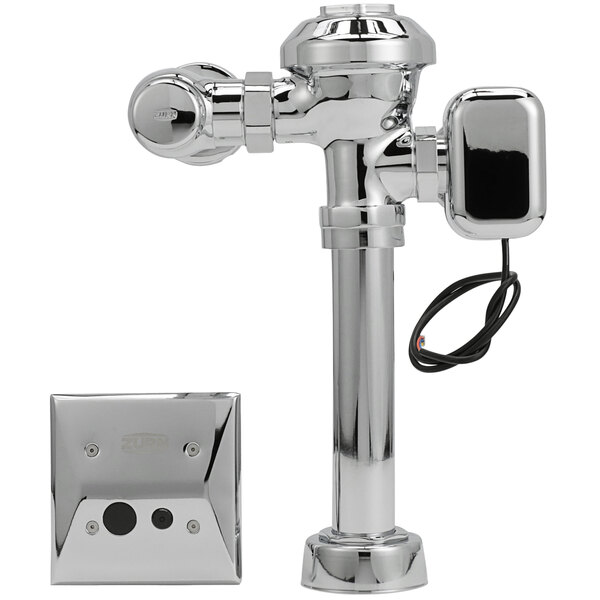 A Zurn chrome plated metal toilet flush valve with hardwired automatic sensor.