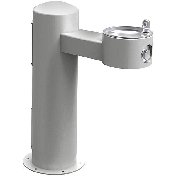 An Elkay gray outdoor pedestal drinking fountain with a round base.
