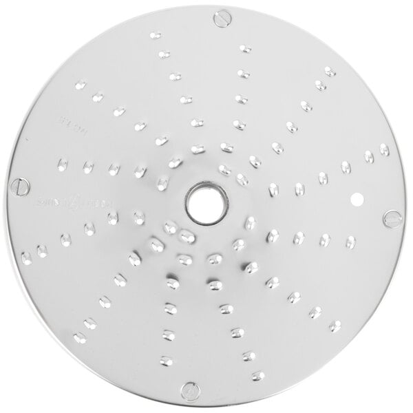 A white circular metal Robot Coupe grating/shredding disc with holes.