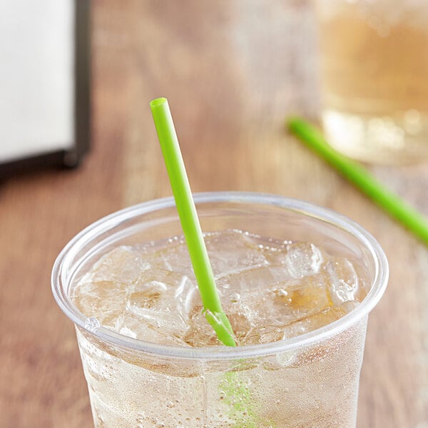 A glass of iced tea with a green EcoChoice PLA straw.
