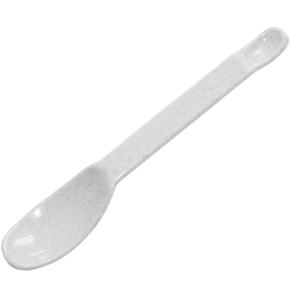 A white plastic spoon with a speckled handle.