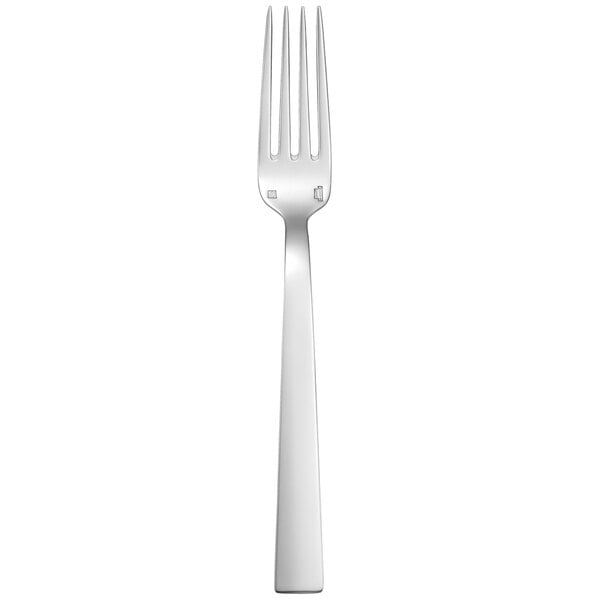 A silver fork with a white handle.