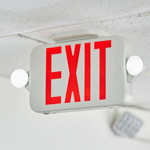 A white rectangular Lavex exit sign with red text.