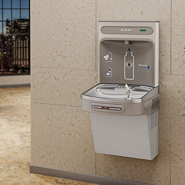 An Elkay wall mount chilled non-filtered bottle filling station with a water fountain.