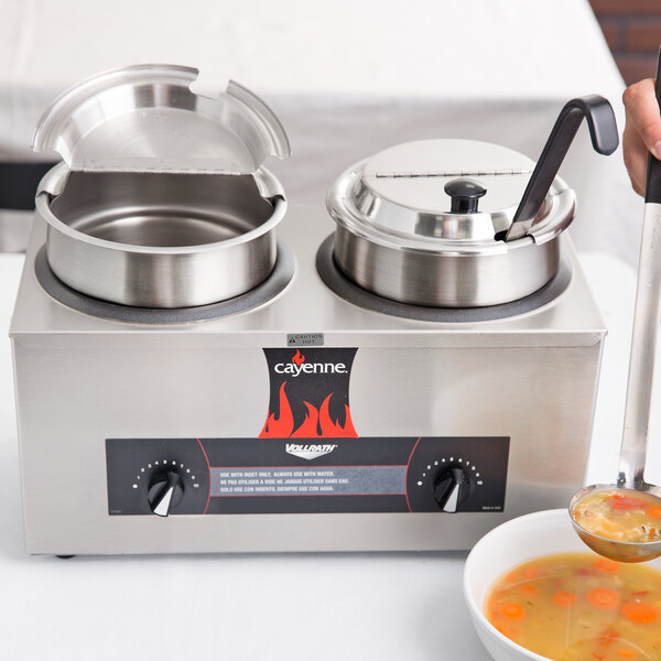 A Vollrath countertop rethermalizer with soup in a bowl.