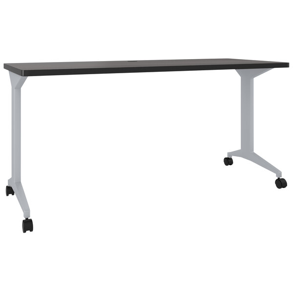 A black rectangular table with wheels and a gray tabletop.