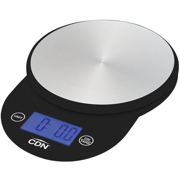 A CDN black round digital kitchen scale on a counter.