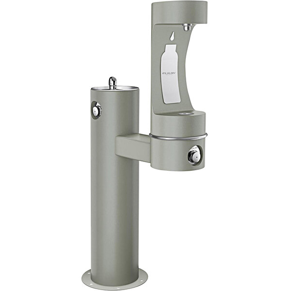An Elkay gray outdoor bi-level water fountain with a bottle filling station.