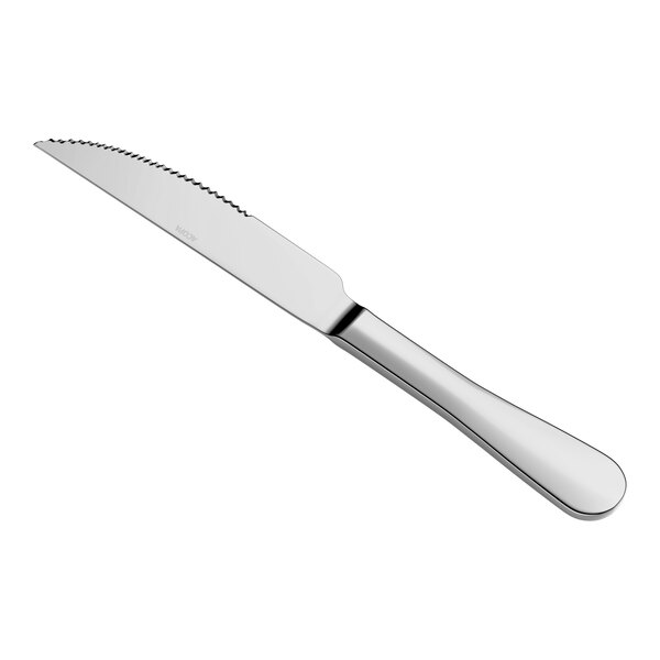 A stainless steel steak knife with a serrated edge and a smooth, rounded handle.