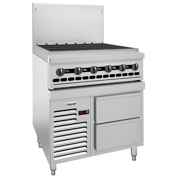 A large stainless steel Vulcan gas charbroiler with a refrigerated base and a door and a drawer.