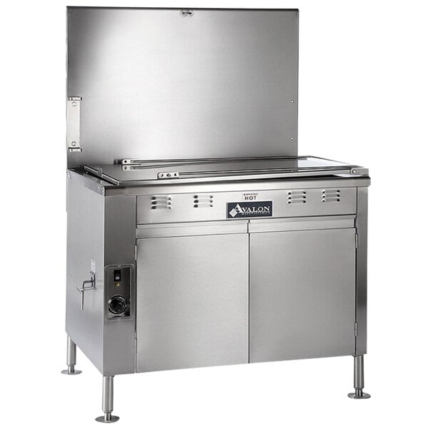 An Avalon Manufacturing stainless steel electric flat bottom donut fryer on a counter in a commercial kitchen.