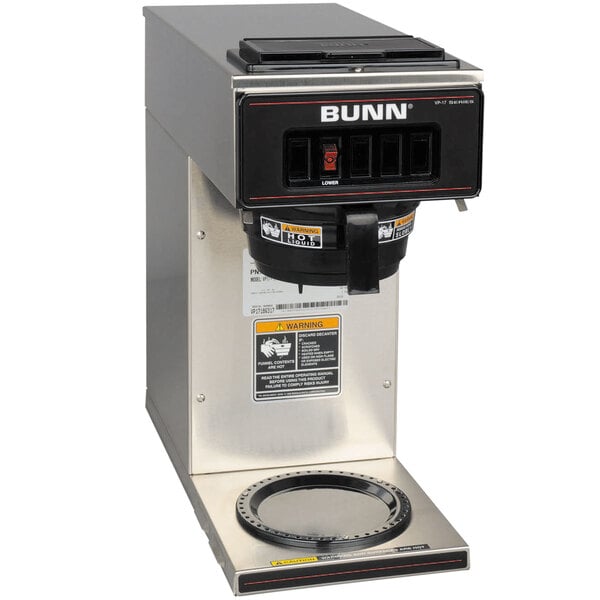 A stainless steel and black Bunn commercial pourover coffee brewer on a counter.