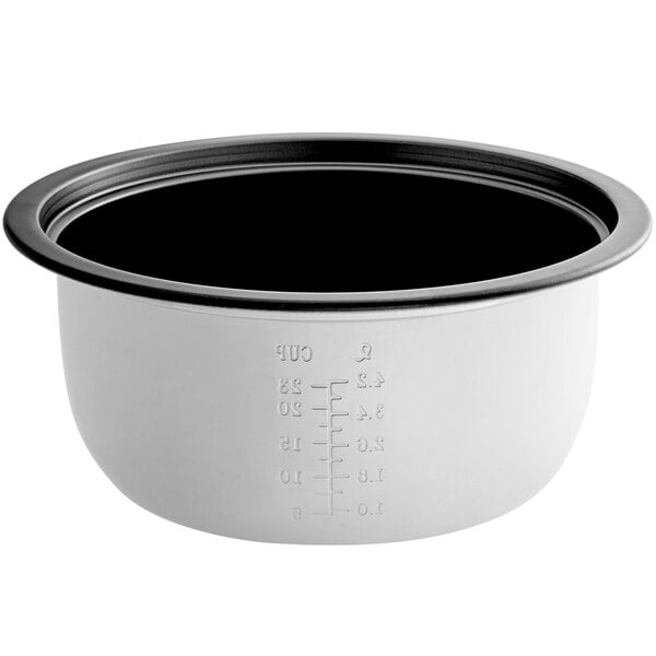 A close-up of a black and white non-stick pot with a black lid.