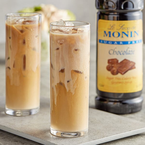 Two glasses of iced coffee with Monin Sugar Free Chocolate syrup.